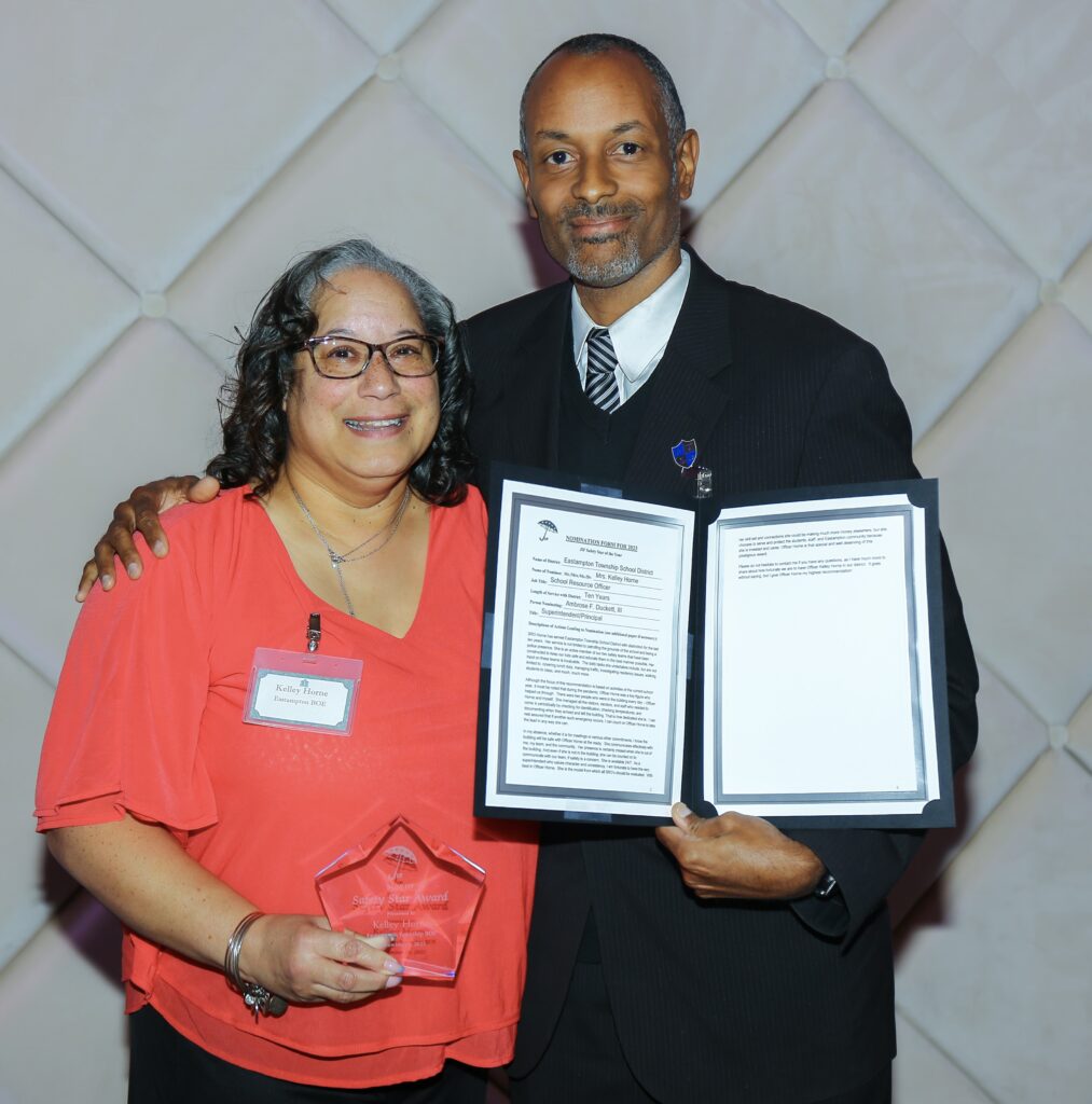 Safety Star Winner School Resource Officer Kelley Horne of Eastampton Twp BOE with Superintendent Ambrose F. Duckett, III